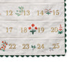 Advent calendar with embroidered numbers and festive designs on a white background