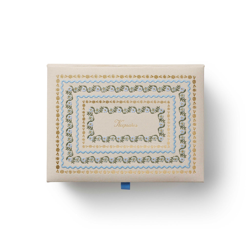 Decorative box with intricate patterns on a white background