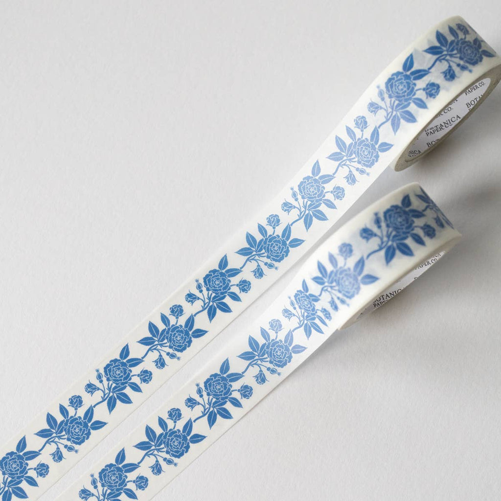 Floral-patterned tape with blue flowers on a white background
