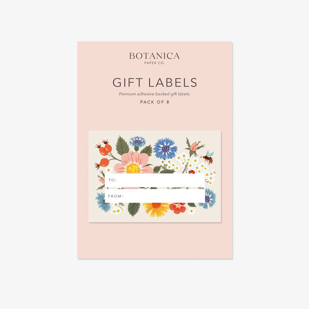 A pack of 8 Botanica Paper Co. gift labels in a soft blush pink package, featuring a central sample label with a colorful floral and insect illustration.