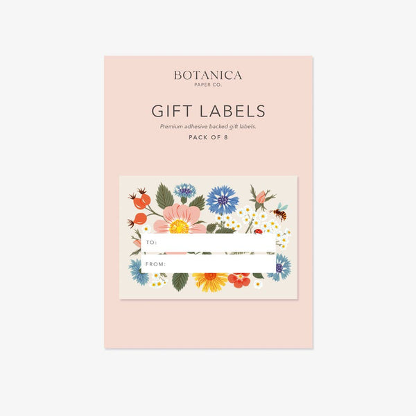 A pack of 8 Botanica Paper Co. gift labels in a soft blush pink package, featuring a central sample label with a colorful floral and insect illustration.