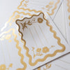 Decorative card with gold floral design on a white background