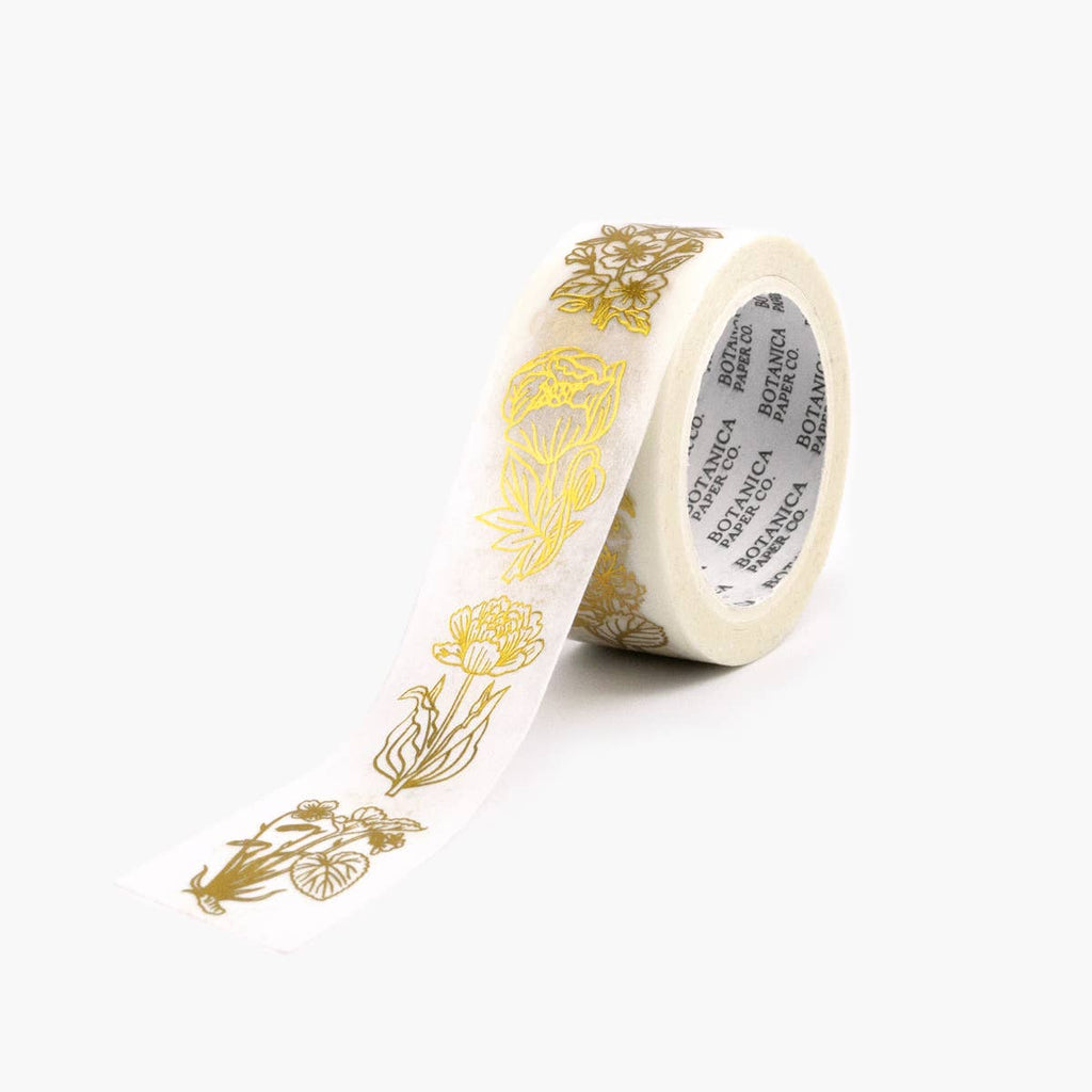 Decorative tape with gold floral designs on a white background