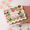 Floral card with 'THANK YOU' text on a decorative box.