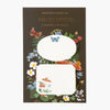 Botanica Paper Co. sticky notes with floral and butterfly design on a brown background