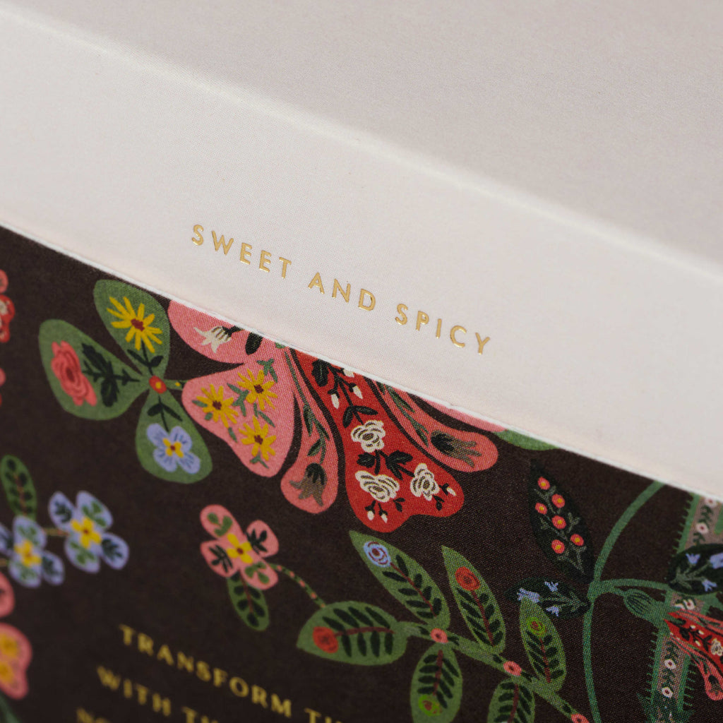 Floral packaging with 'Sweet and Spicy' text on a white background