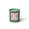 Green candle with floral design and text on a white background