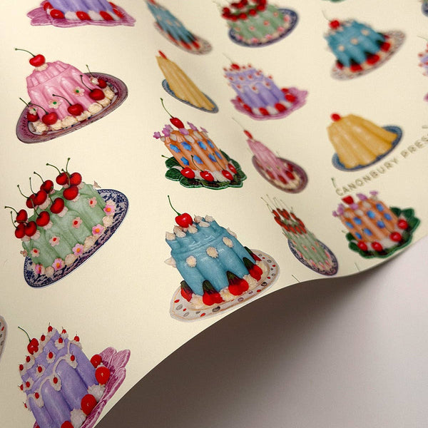 Sheet of colorful cake stickers with 'Lemonsbury Press' branding.