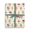 Gift box with ice cream pattern and green ribbon on a white background