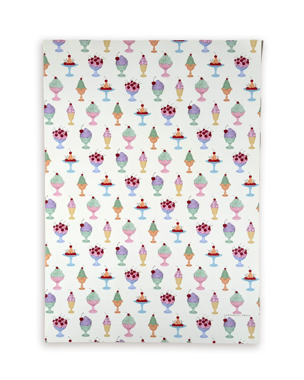 Patterned paper with ice cream and cake illustrations on a white background