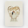 Decorative card with a heart-shaped frame, bow, and floral elements on a white background