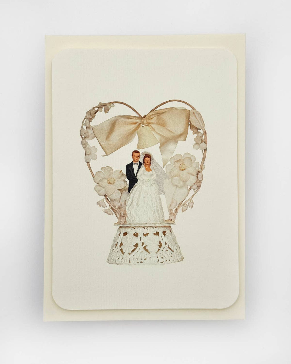 Wedding card with a couple in a heart-shaped frame on a white background