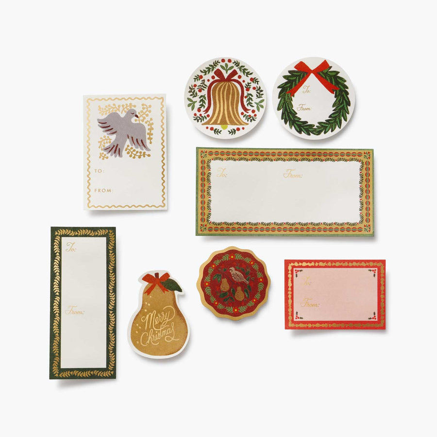 Set of Christmas-themed stationery items including cards and coasters on a white background