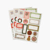 Set of Christmas-themed stationery sheets with various designs on a white background