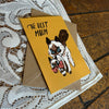 Greeting card with illustration of two cats and 'The Best Mum' text on a lace tablecloth.