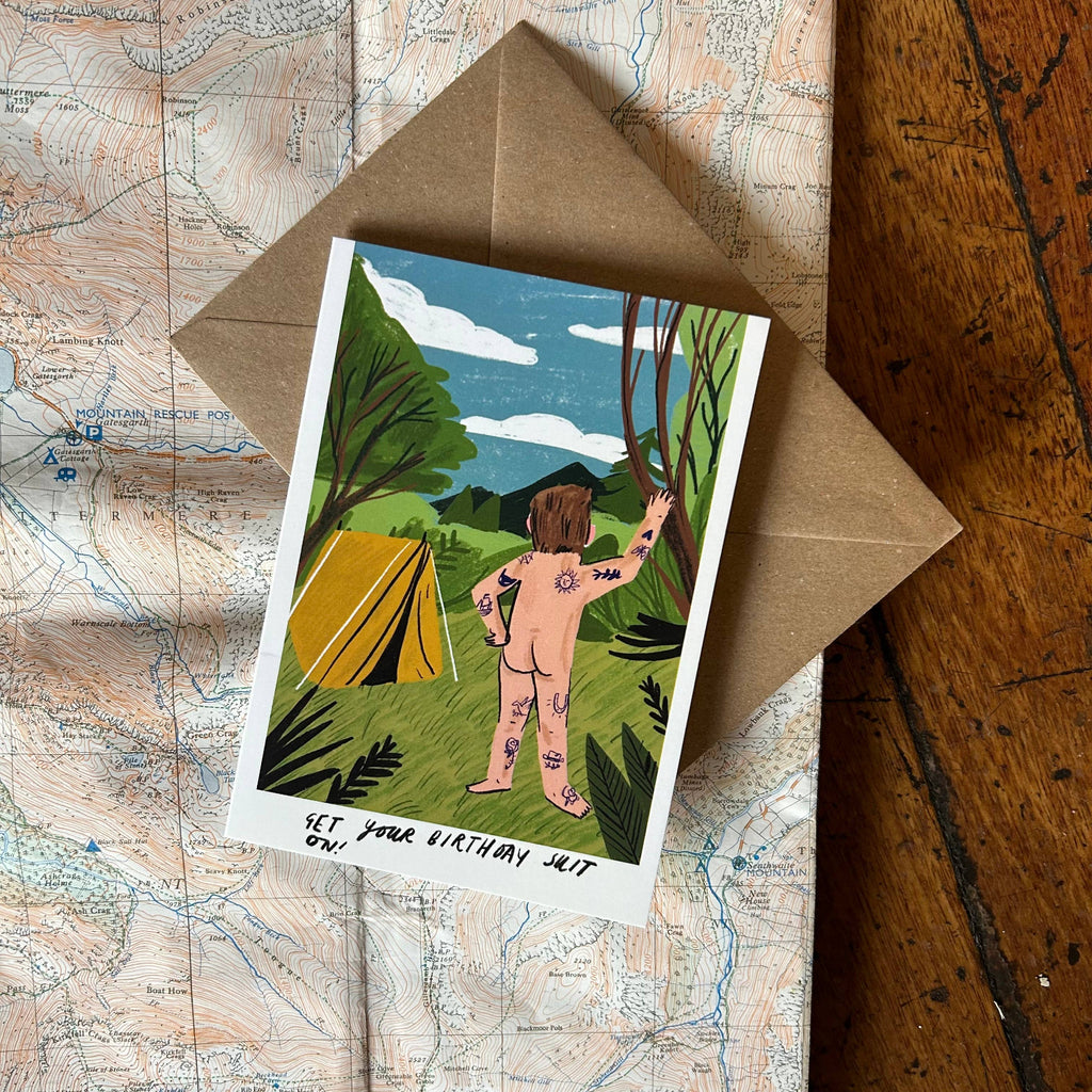Illustrated card with a person by a tent on a map background