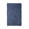 Blue patterned fabric on a white background
