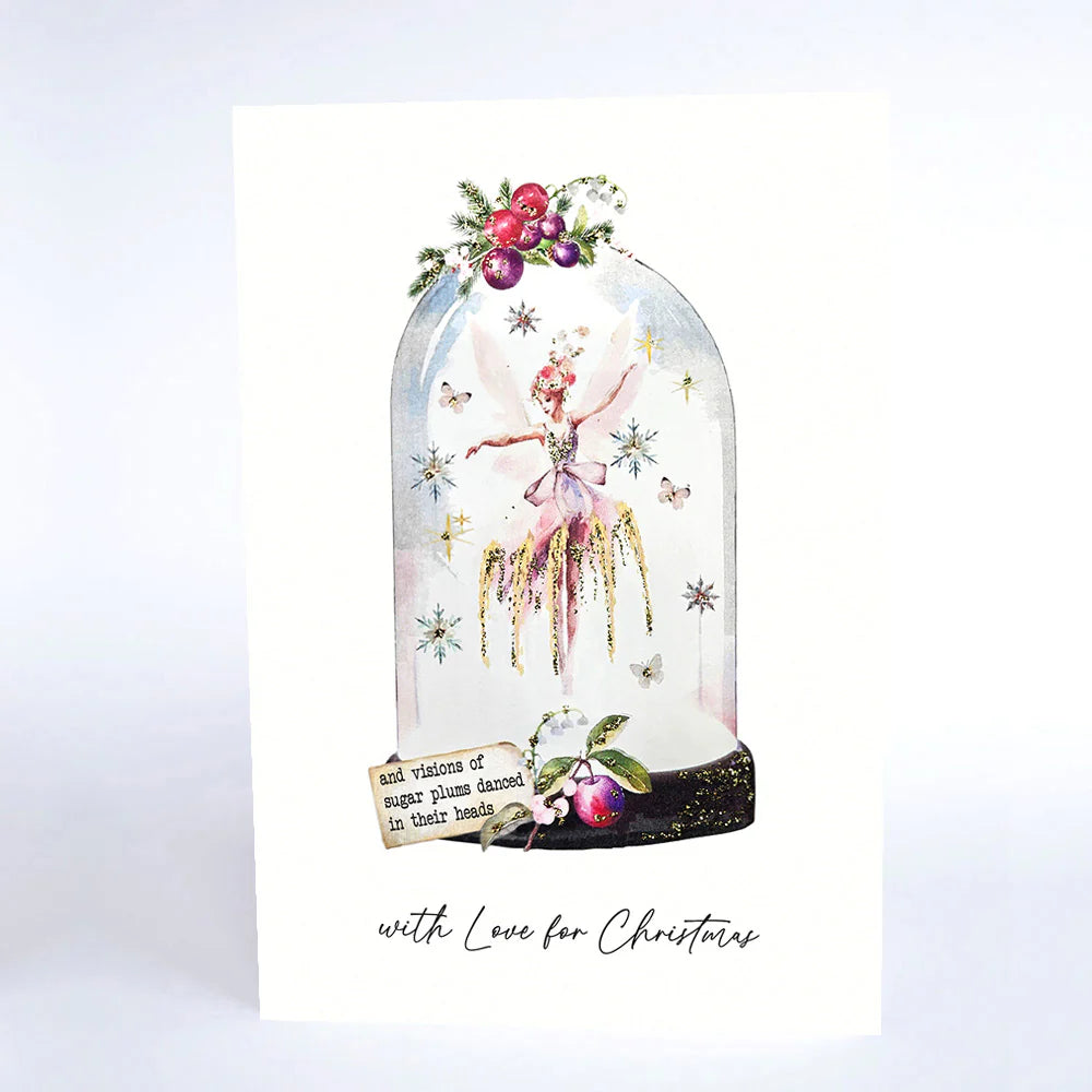 Decorative card with a fairy in a glass dome, surrounded by flowers and text, on a light gray background.