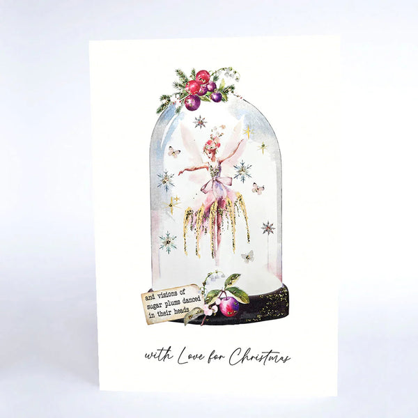 Decorative card with a fairy in a glass dome, surrounded by flowers and text, on a light gray background.