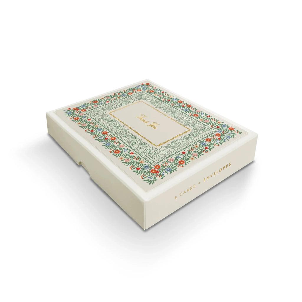 Decorative box with floral design on a white background