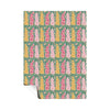 Patterned paper with floral and bottle design on a white background