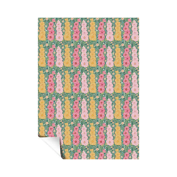 Patterned paper with floral and bottle design on a white background
