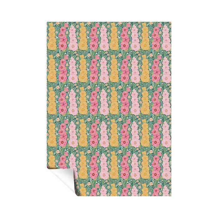 Patterned paper with floral and bottle design on a white background
