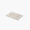 Sheet of white labels with gold borders on a white background