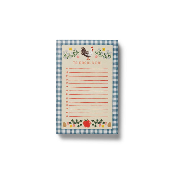 Notepad with a checkered border and decorative elements on a white background