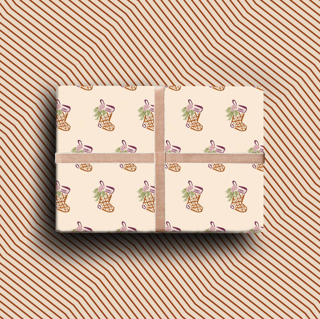 Pack of four luxury Christmas cards with gold foil, featuring festive stocking illustrations on textured cream cardstock.