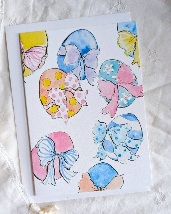 Card with colorful butterfly illustrations on a textured white background