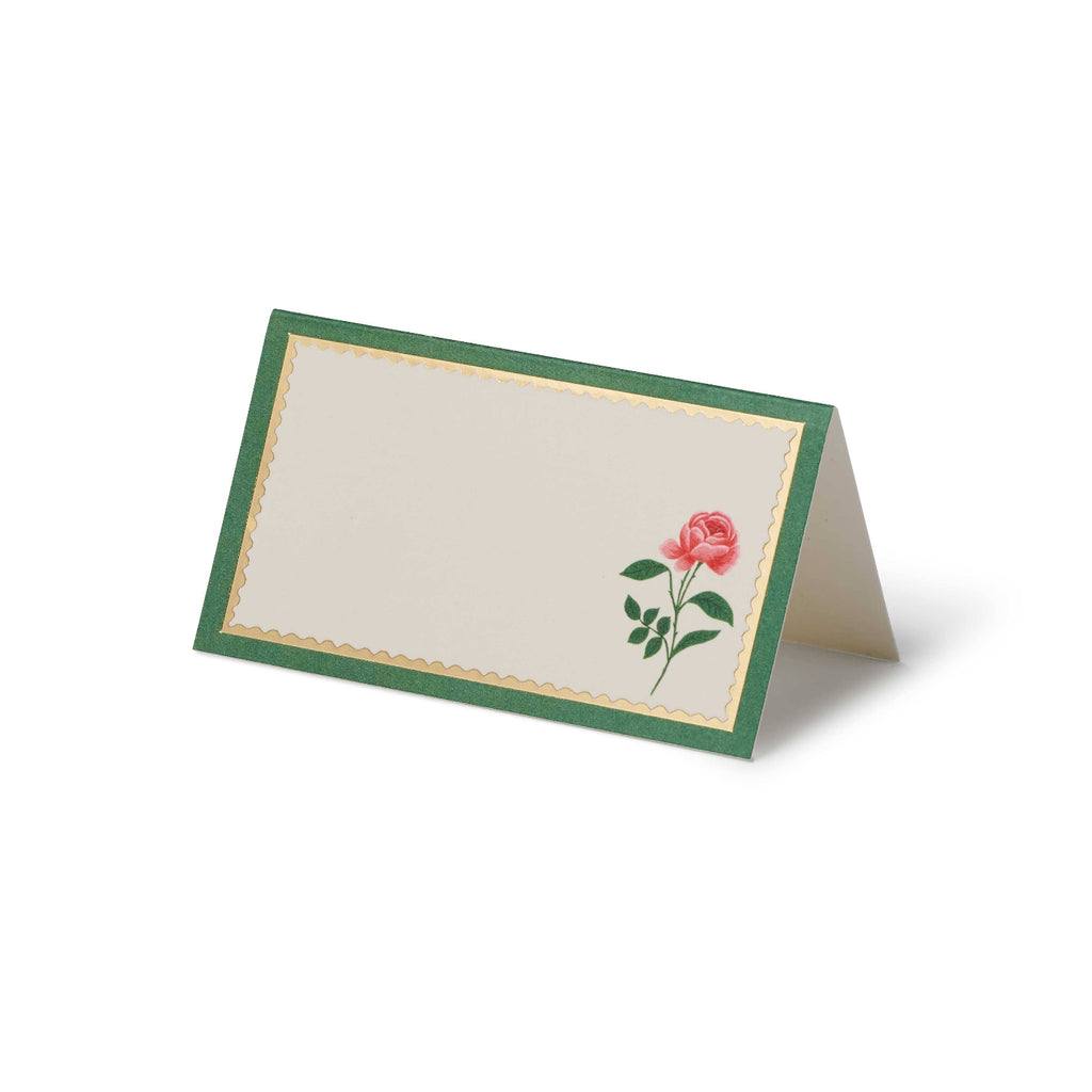 Folded card with a red rose design on a white background
