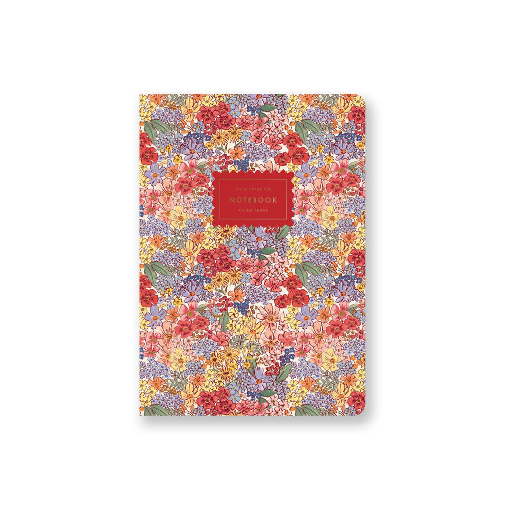 Floral notebook with a red label on a white background