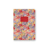 Floral notebook with a red label on a white background