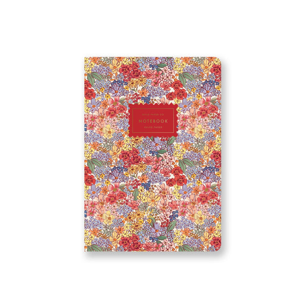 Floral notebook with a red label on a white background