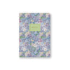 Floral notebook with a green label on a white background
