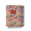 Floral notebook with a red label on a white background