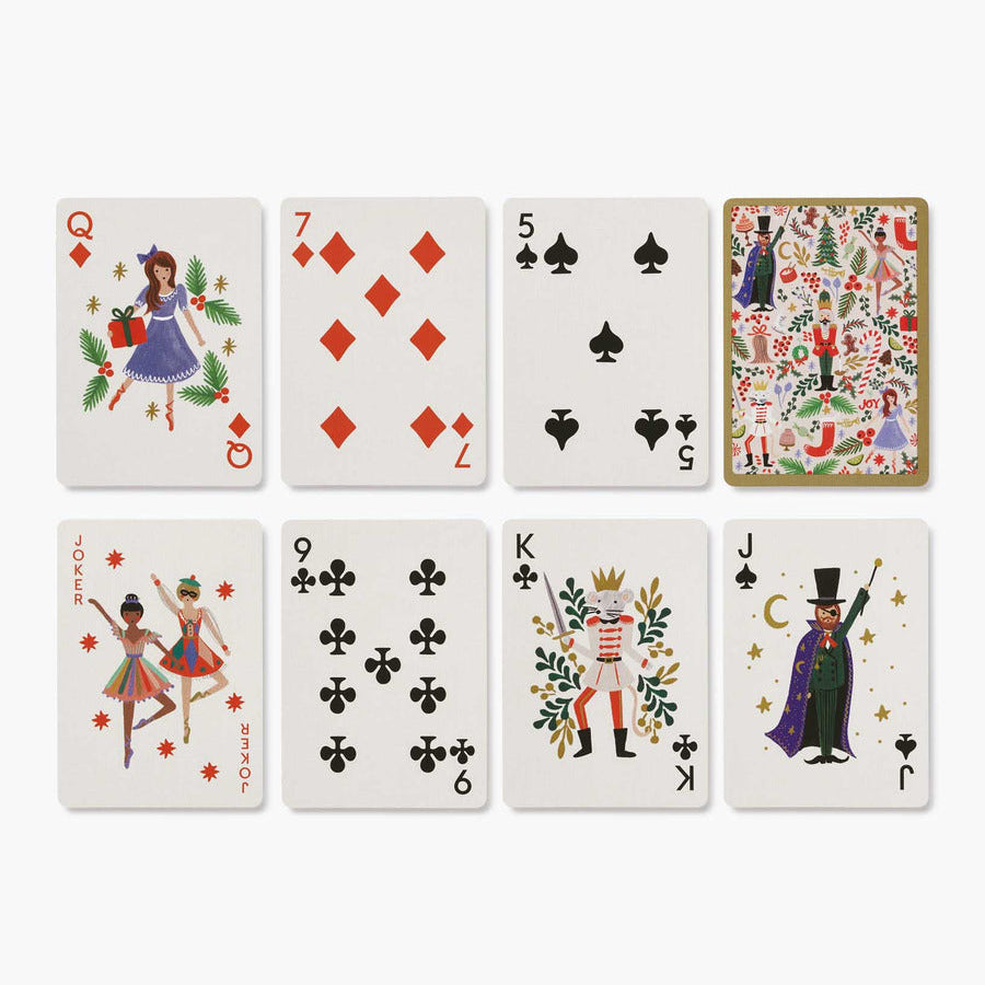 Set of playing cards with decorative designs on a white background