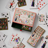 Set of playing cards with decorative box on a white background