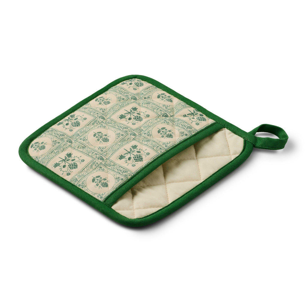 Green and beige patterned pot holder on a white background