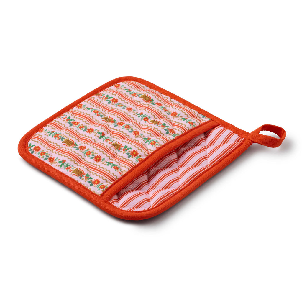 Floral patterned pot holder with orange border on a white background