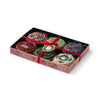 Box of decorative cookies with festive designs on a white background