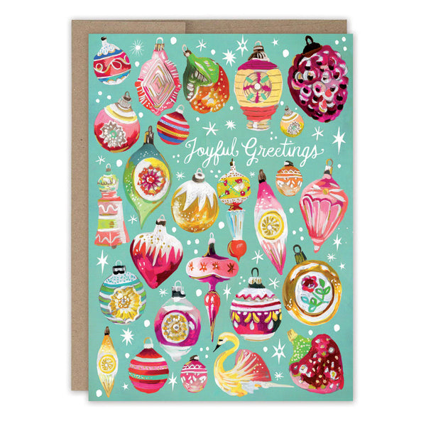 Greeting card with colorful Christmas ornaments and 'Joyful Greetings' text on a teal background.