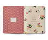 Two planners side by side, one with a pink floral pattern and the other with a beige cover featuring floral designs and the year 2026.