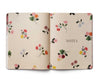 Floral notebook with 'NOTES' text on a beige background