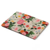 Floral patterned notebook with a pink label on a white background