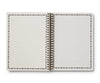 Open notebook with lined pages on a white background