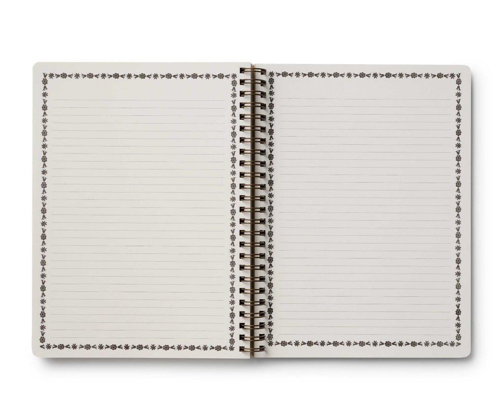 Open notebook with lined pages on a white background
