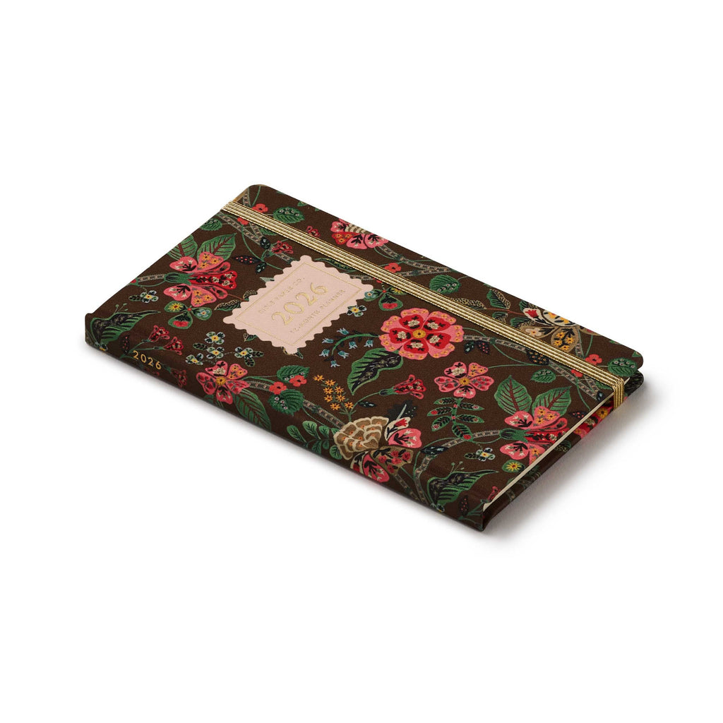 Floral patterned notebook on a white background