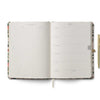 Open planner with floral design on a white background